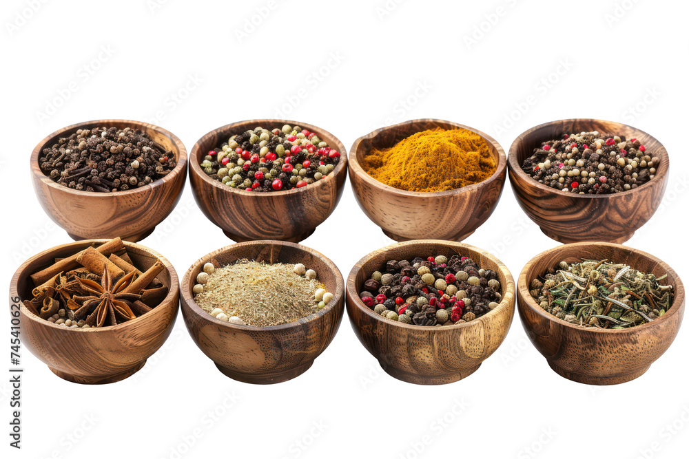 Assorted spices in wooden bowls, cut out - stock png.