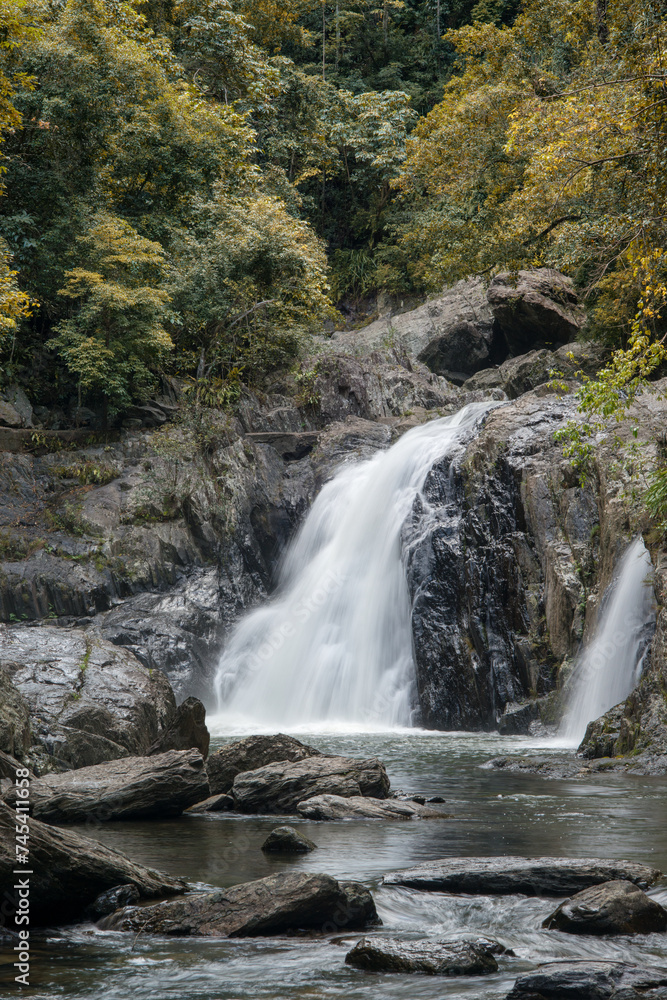 Crystal Cascades near Cairns, Far North Queensland, showcases pristine waterfalls, lush rainforest, and tranquil pools amidst tropical beauty. Crystal Cascades near Cairns, Far North Queensland, showcases pristine waterfalls, lush rainforest, and tranquil pools amidst tropical beauty.