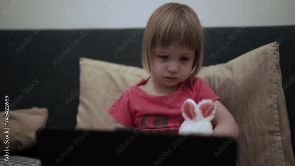 little girl watching cartoon on tablet on youtube little girl watching cartoon on tablet on youtube