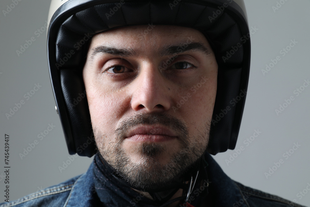 Portrait of bearded man wearing helmet looking at the camera. Mock-up. Portrait of bearded man wearing helmet looking at the camera. Mock-up.