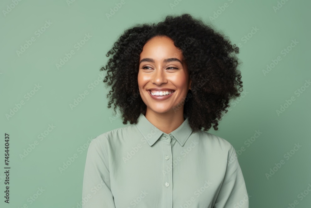 Portrait of smiling african american woman with curly hairstyle Portrait of smiling african american woman with curly hairstyle