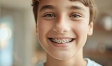 A smiling teenager with braces mouth, close up