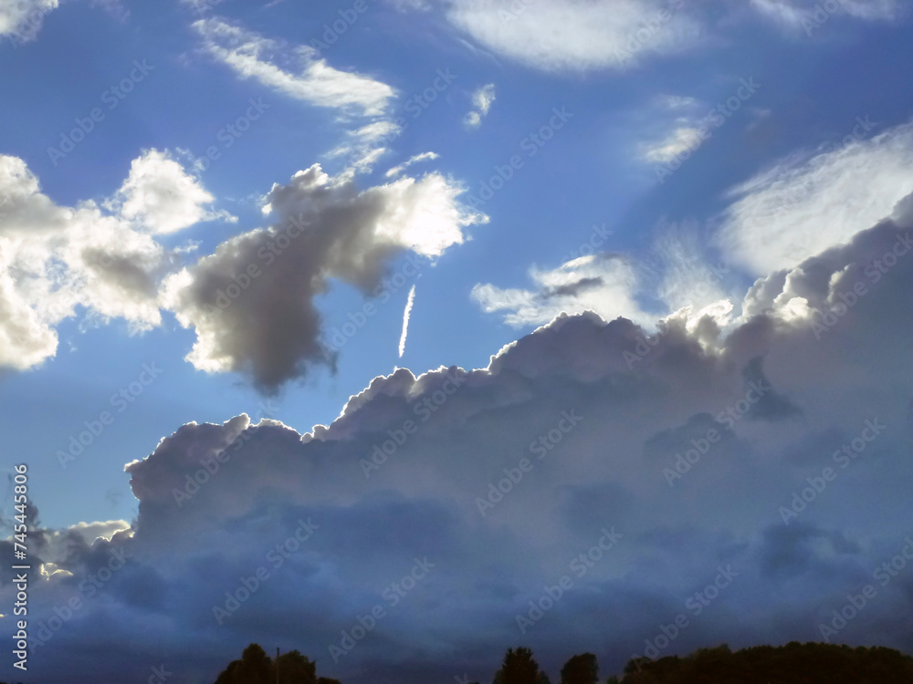 View of white clouds and clear blue sky. Natural landscape View of white clouds and clear blue sky. Natural landscape