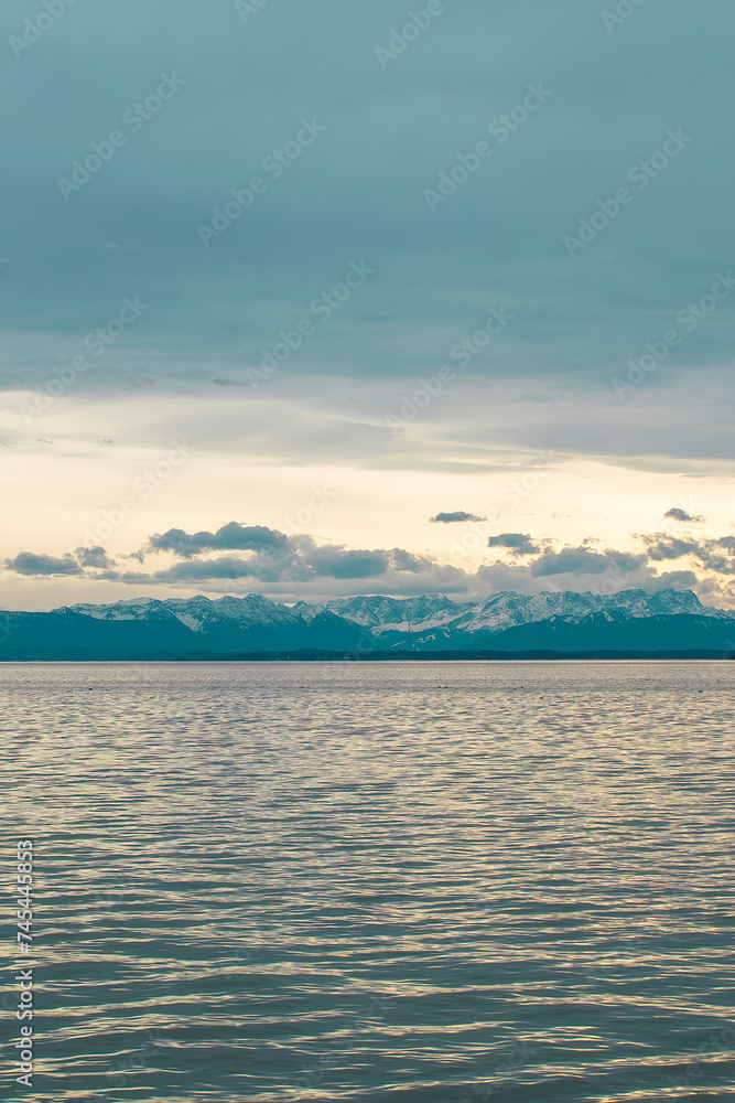 Obraz premium View of Lake Starnberg in Bavaria and the Alps. Lake Starnberg with the Alps in the background