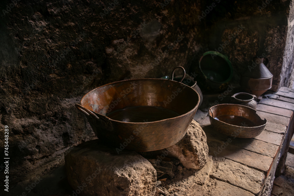 Antique utensil on historic monastery kitchen at Arequipa Antique utensil on historic monastery kitchen at Arequipa