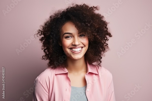 Portrait of a beautiful young african american woman with curly hair