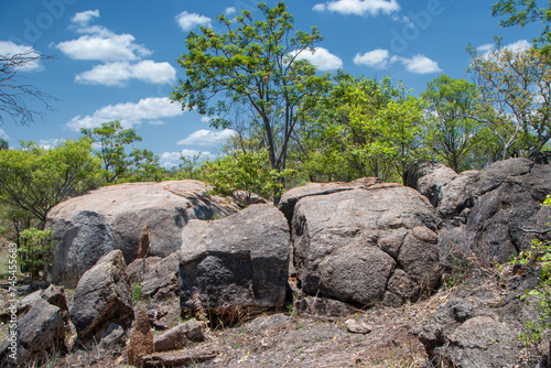 Near Georgetown, Far North Queensland, Australia, rugged Outback scenery showcases granite boulders amidst vast wilderness