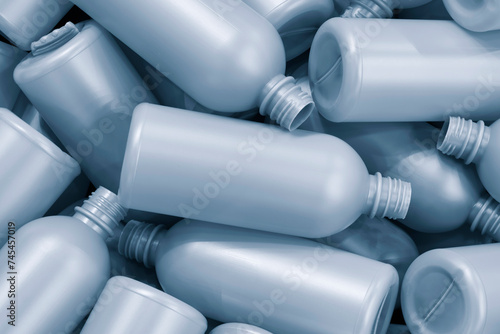Empty plastic bottles as a background for an industrial concept