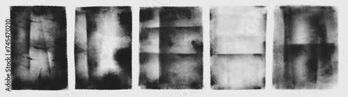 Black and white halftone textured posters collection. Grunge brush strokes and scratches.