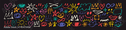 Colorful brush drawn doodle elements like crowns, hearts, stars, eyes and various icons. Hand drawn vector illustration in punk childish style.