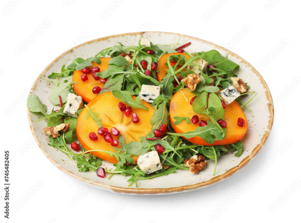 Tasty salad with persimmon, blue cheese, pomegranate and walnuts isolated on white