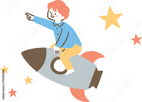 指を差してロケットに乗っている少年_色