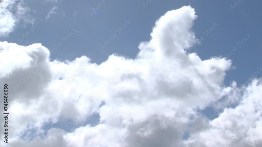 White Clouds Moving Across the Blue Sky. White Clouds Moving Across the Blue Sky.