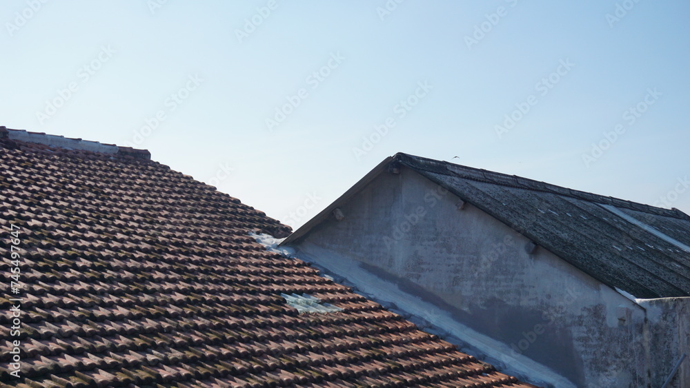 The neatly arranged tile roofs form a texture 