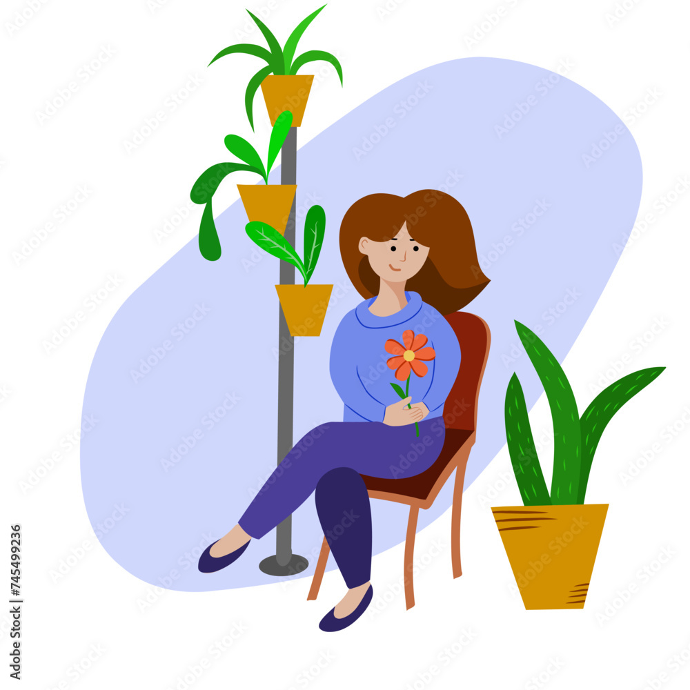Smiling girl with a flower among indoor plants.
Smiling girl with a flower among indoor plants.