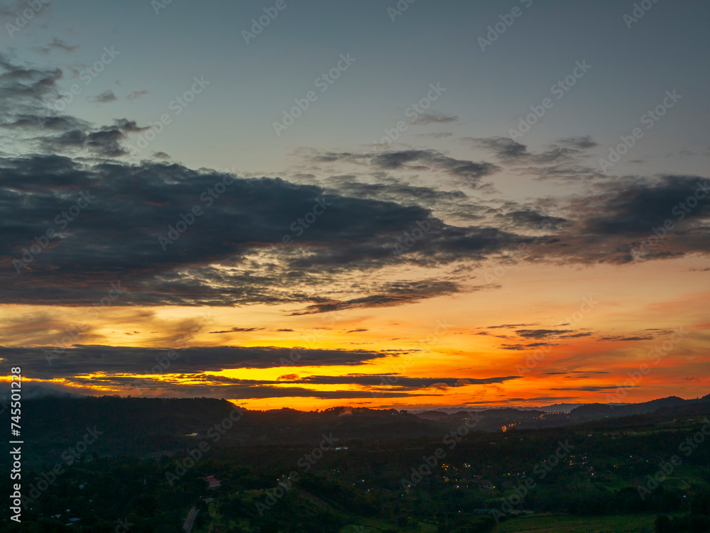 Sunset mountain range beautiful landscape mist, dusk golden time dramatic sky. Beautiful landscape high mountain ridge mist panning panorama scenery dawn dramatic sky. Sunrise landscape mountain peak.