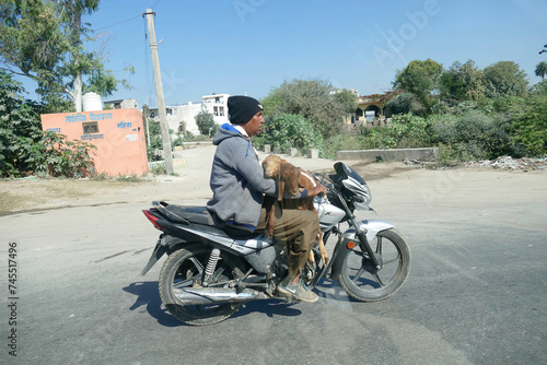 CHITTORGARH, INDIA - JAN 10, 2020 - Motorcycles in traffic on roads near  Chittorgarh in Rajasthan, India photo