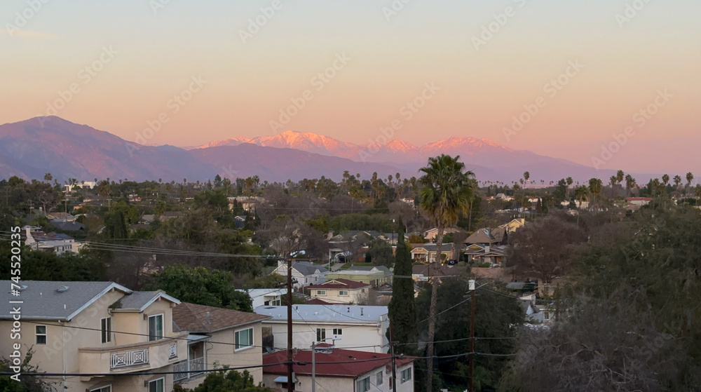 Los Angeles - San Gabriel Mountains and Valley at sunet, snowtop mountainside and landscape