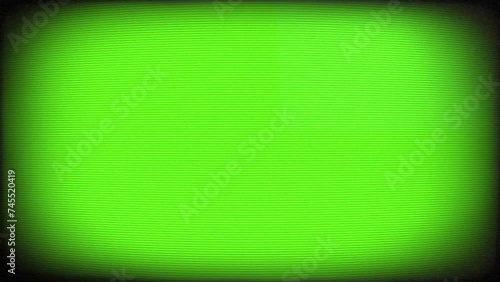Television screen with green background and glitch and static effects photo