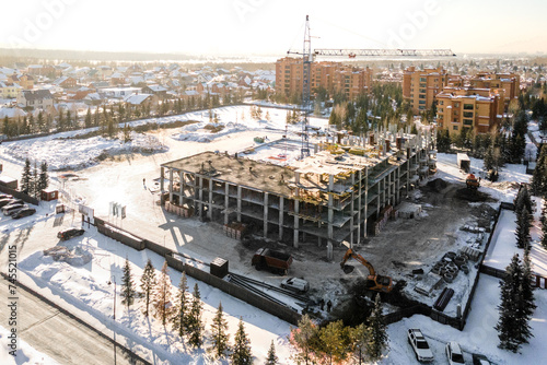 Photography the construction site of an apartment building in the winter from a height