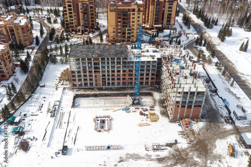 Canvas Print the construction site of an apartment building in the winter from a height