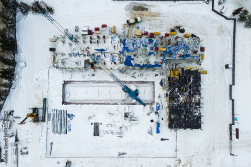 Photography the construction site of an apartment building in the winter from a height
