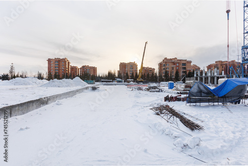 Photography the construction site of an apartment building in the winter from a height