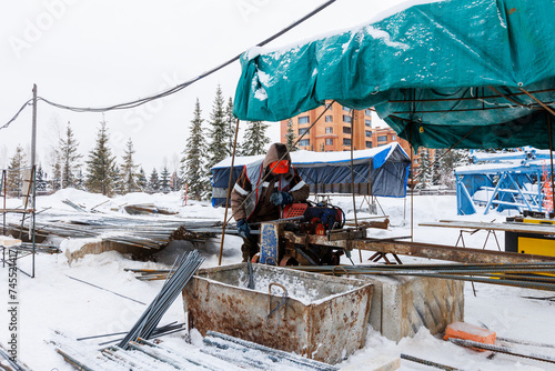 Photography the construction site of an apartment building in the winter from a height