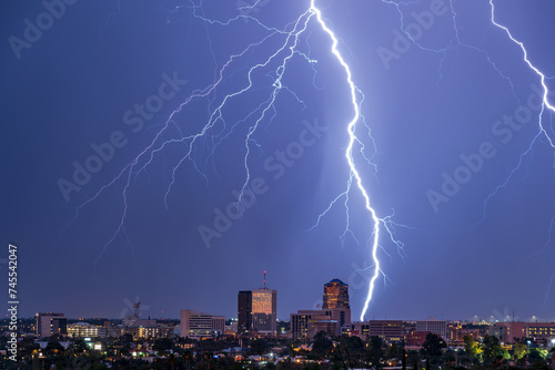 Nighttime Lightning Over Cityscape Storm Photography 