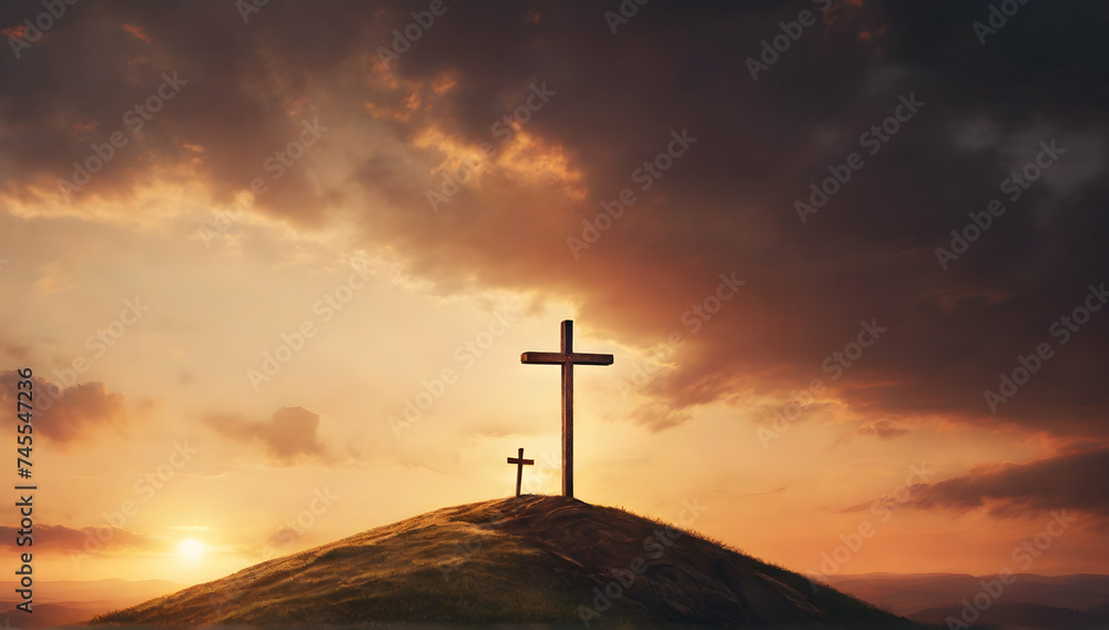 Silhouette of shining cross symbol on top hills with sunset background.