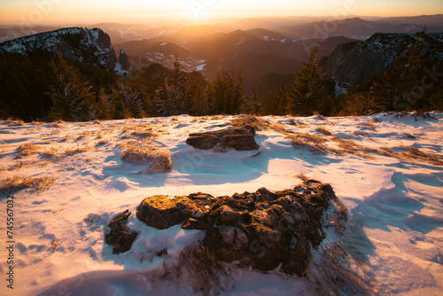 Beautiful sunrise at winter in Ceahlau Mountains, Romania