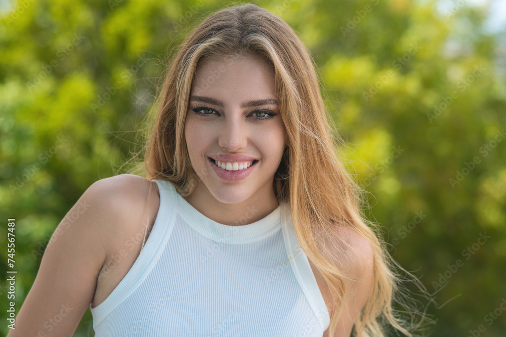 Smiling face. Female face happy portrait. Close up portrait of young happy smiling girl. Young woman smiling with teeth, looking in camera with happy face expression. Smiling female portrait. Smiling face. Female face happy portrait. Close up portrait of young happy smiling girl. Young woman smiling with teeth, looking in camera with happy face expression. Smiling female portrait.