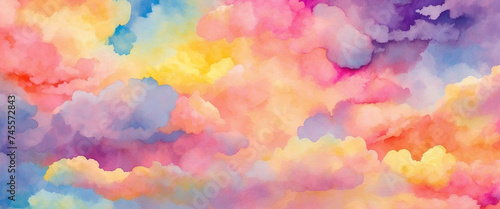 Colorful watercolor abstract background with cloud pattern symbolizes beauty, with bright shades of orange, yellow, blue, pink and purple.