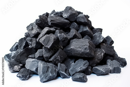 Pile of coal isolated on white background. Natural energy concept.
