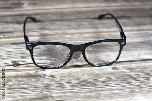 Glasses, eyeglasses or spectacles, vision eyewear with lenses, typically used for vision correction, such as with reading glasses and glasses used for nearsightedness, safety glasses for protection