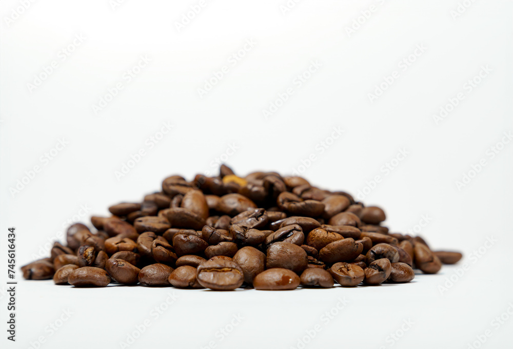 pile of coffee beans isolated on white background and copy space pile of coffee beans isolated on white background and copy space