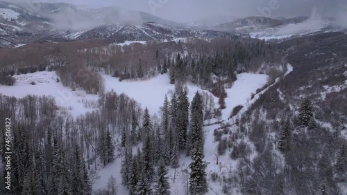 Aspen Snowmass Pitkin county cabin wilderness aerial drone Rocky Mountains Colorado Basalt Carbondale Mt Sopris Maroon Bells Ashcroft Independence Pass foggy snowy road morning cloudy mist upward jib photo