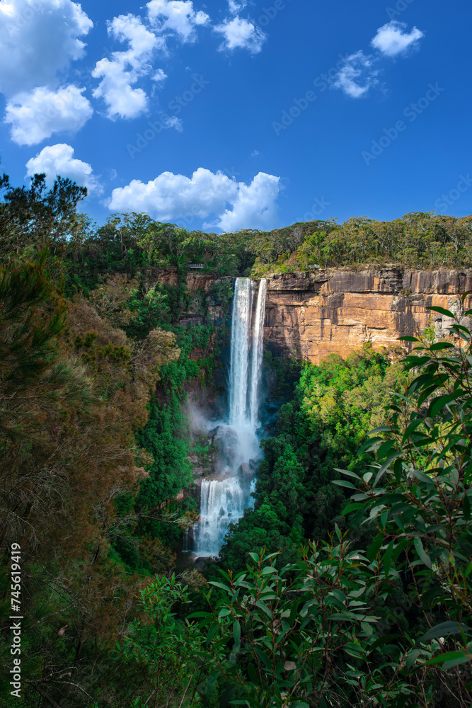 Beautiful flowing River in Fitzroy water Falls in Bowral NSW Australia beautiful colourful cloudy skies lovely waterfalls