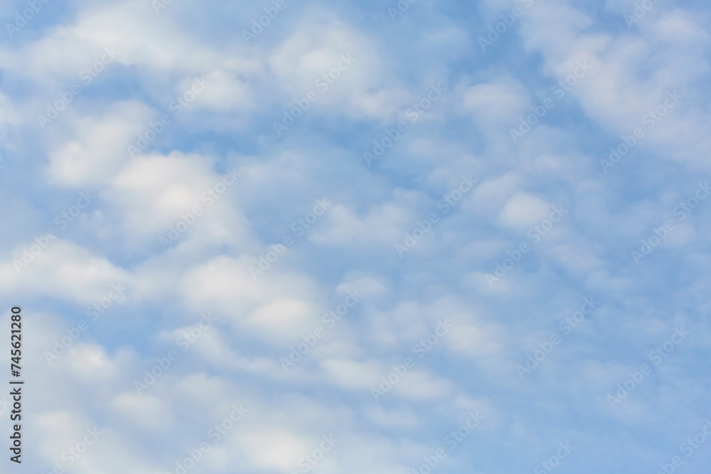 Blue sky background with tiny clouds. Atmosphere background or wallpaper Blue sky background with tiny clouds. Atmosphere background or wallpaper