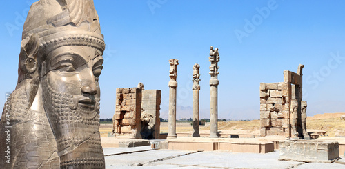 Horizontal banner with Gate of All Nations (Xerxes Gate) and face of assyrian protective deity lamassu - human-headed winged bull, Persepolis, Iran photo