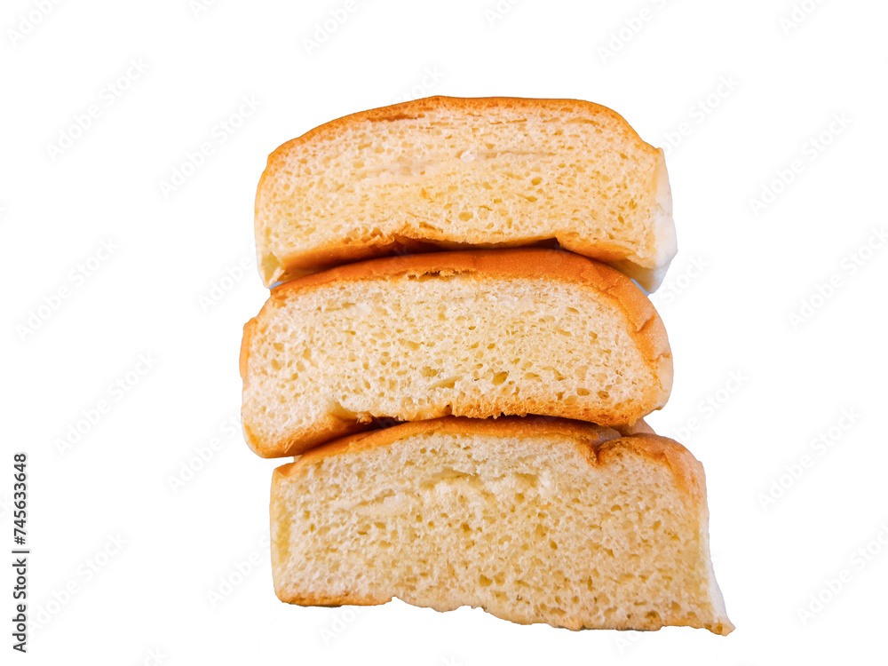 Soft white bread resting with one slice resting on a white background. close up and selective focus isolated on white background. Soft white bread resting with one slice resting on a white background. close up and selective focus isolated on white background.