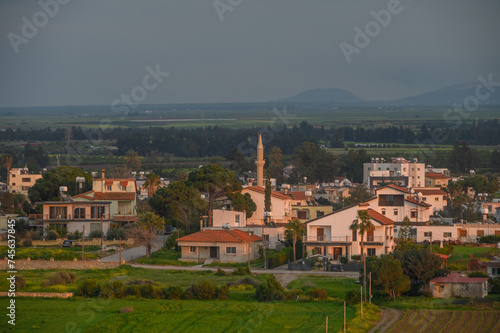 village with mosque at sunset in winter in Cyprus 1 © Михаил Шорохов