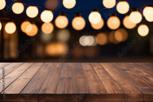 Empty wooden table with blurred lights in the background, with copy space - Product showing