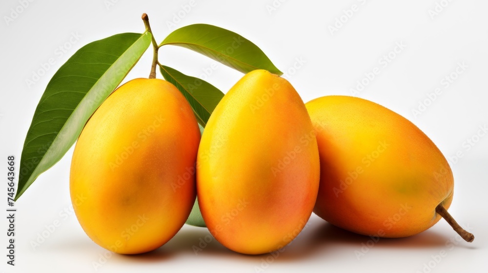 Three vibrant yellow mangoes captured in a close-up realistic photo on a white background Generative AI Three vibrant yellow mangoes captured in a close-up realistic photo on a white background Generative AI