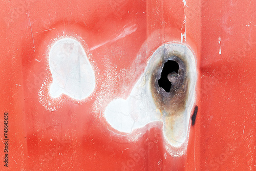 wall of the container with a hole from welding