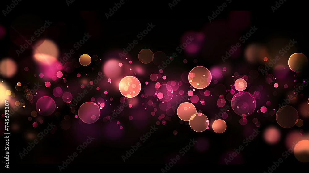 Shining pink and golden bokeh on the black background