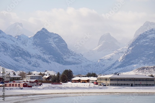 Beautiful village with snow mountain background.  © Chaiwat