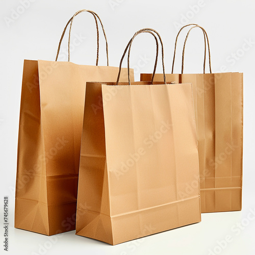 Paper bags for shopping, gifts and food bags minimalist design. Brown kraft paper or cardboard bags with handles. Shopping conceptual trendy. White background. Eco, recycle