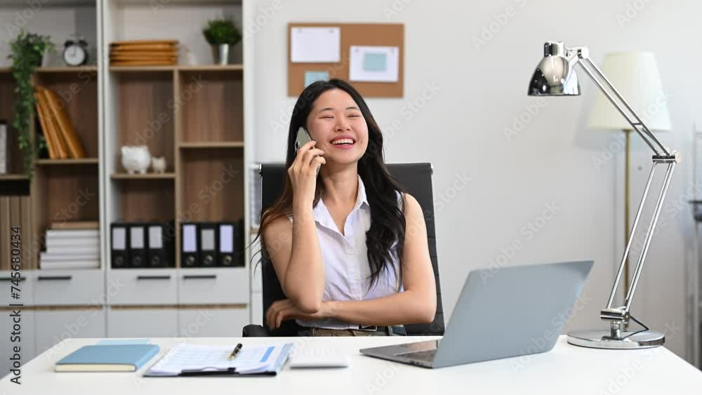 Asian businesswoman working in the office with working notepad, tablet and laptop documents . Asian businesswoman working in the office with working notepad, tablet and laptop documents .