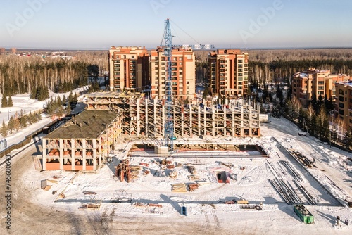 Photography the construction site of an apartment building in the winter from a height